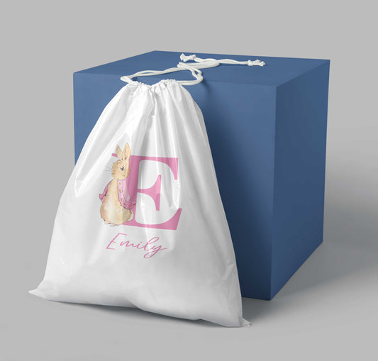 Personalised Easter drawstring bag with Peter Rabbit design in blue or pink