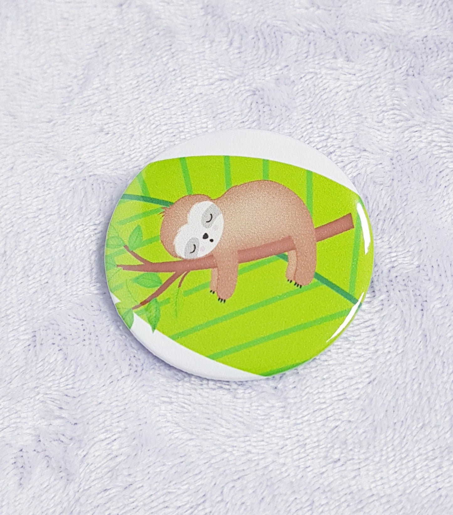 Sloth compact pocket mirror showing front sloth design and back mirror surface