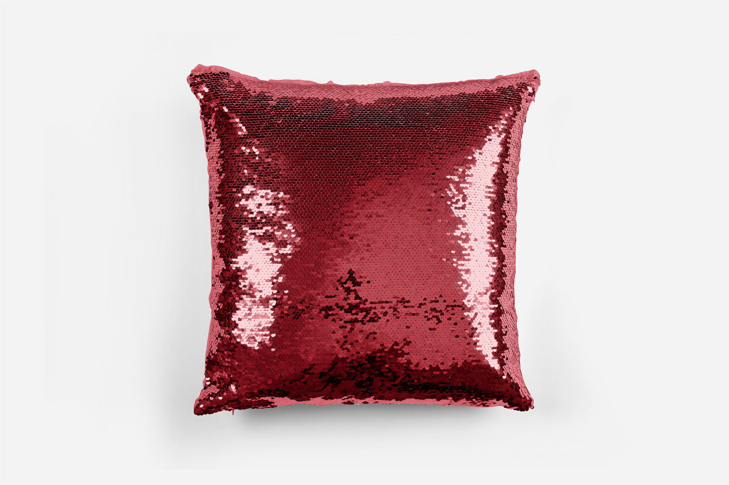Personalised sequin reversible cushion showing sequin swiping to reveal custom text