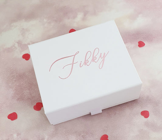 Contents of luxury birthday pamper gift box showing vegan bath products and personalised mirror