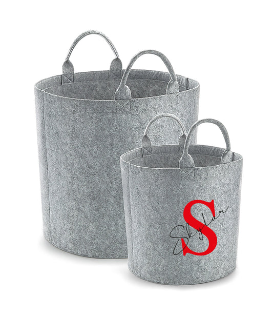 Personalised felt storage bags in charcoal and grey showing name personalisation detail