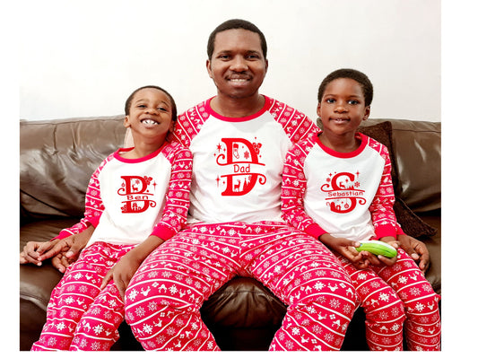 Adult matching Christmas pyjamas set with personalised festive monogram name design