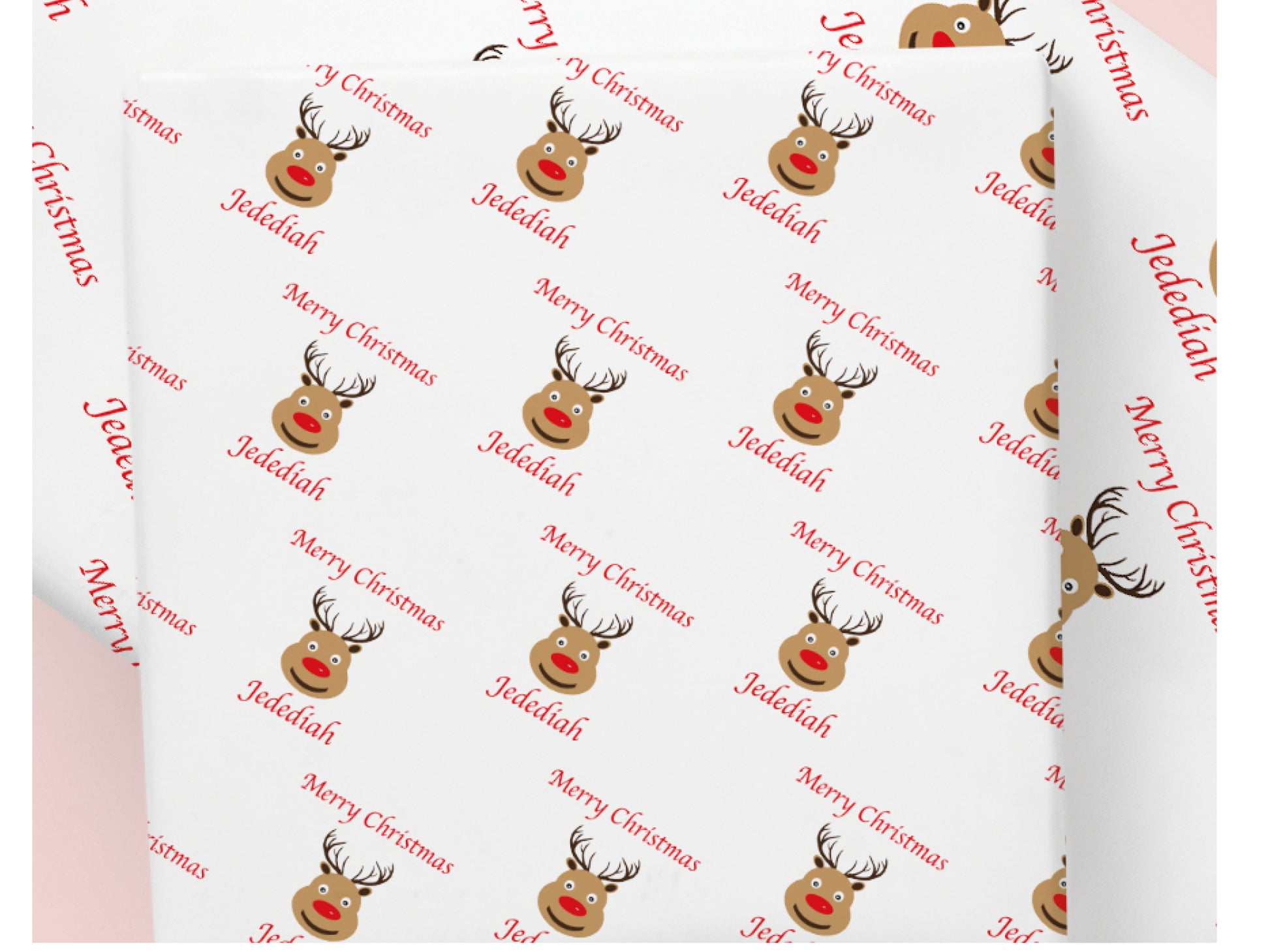 Personalised reindeer Christmas wrapping paper with custom name and Merry Christmas