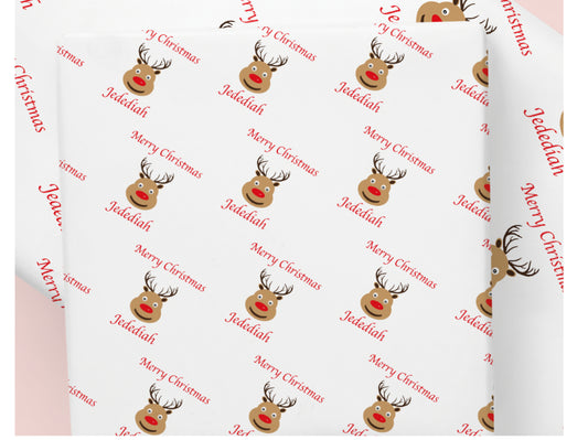 Personalised reindeer Christmas wrapping paper with custom name and Merry Christmas