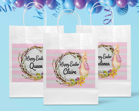 Easter gift bags showing pink and blue Peter Rabbit designs