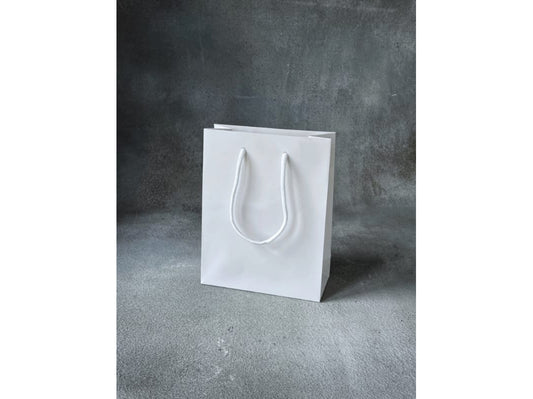 Personalised pink unicorn gift bag showing bag handle options for flower girls