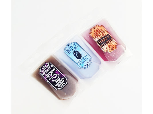 Halloween drink pouch with spooky label design filled with drink