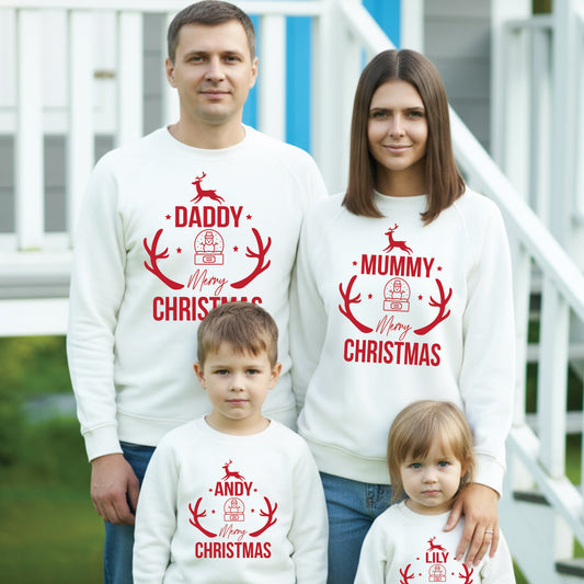 Matching family Christmas jumpers with personalised names