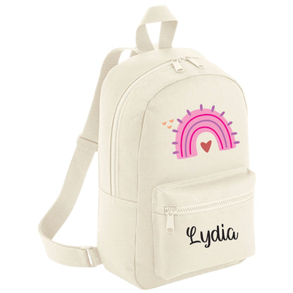 Rainbow school bag showing adjustable straps and front pocket