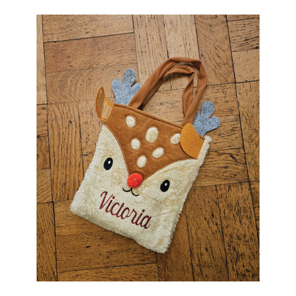 Personalised reindeer gift bag showing glitter name colour options