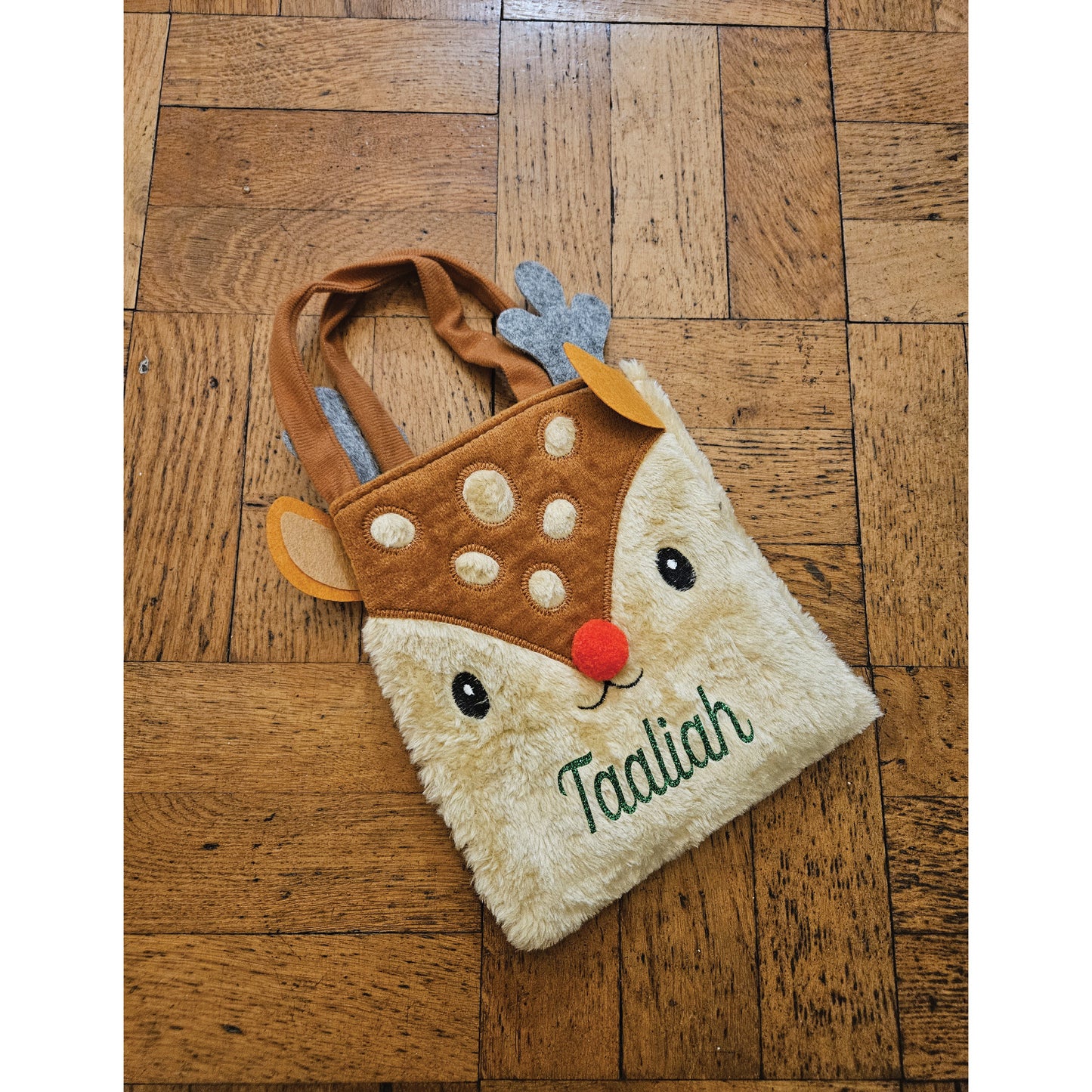 Felt reindeer Christmas gift bag with personalised glitter name detail