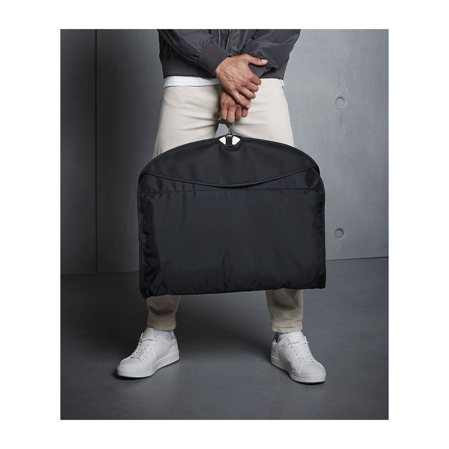 Personalised groomsman suit cover displayed with wedding suit