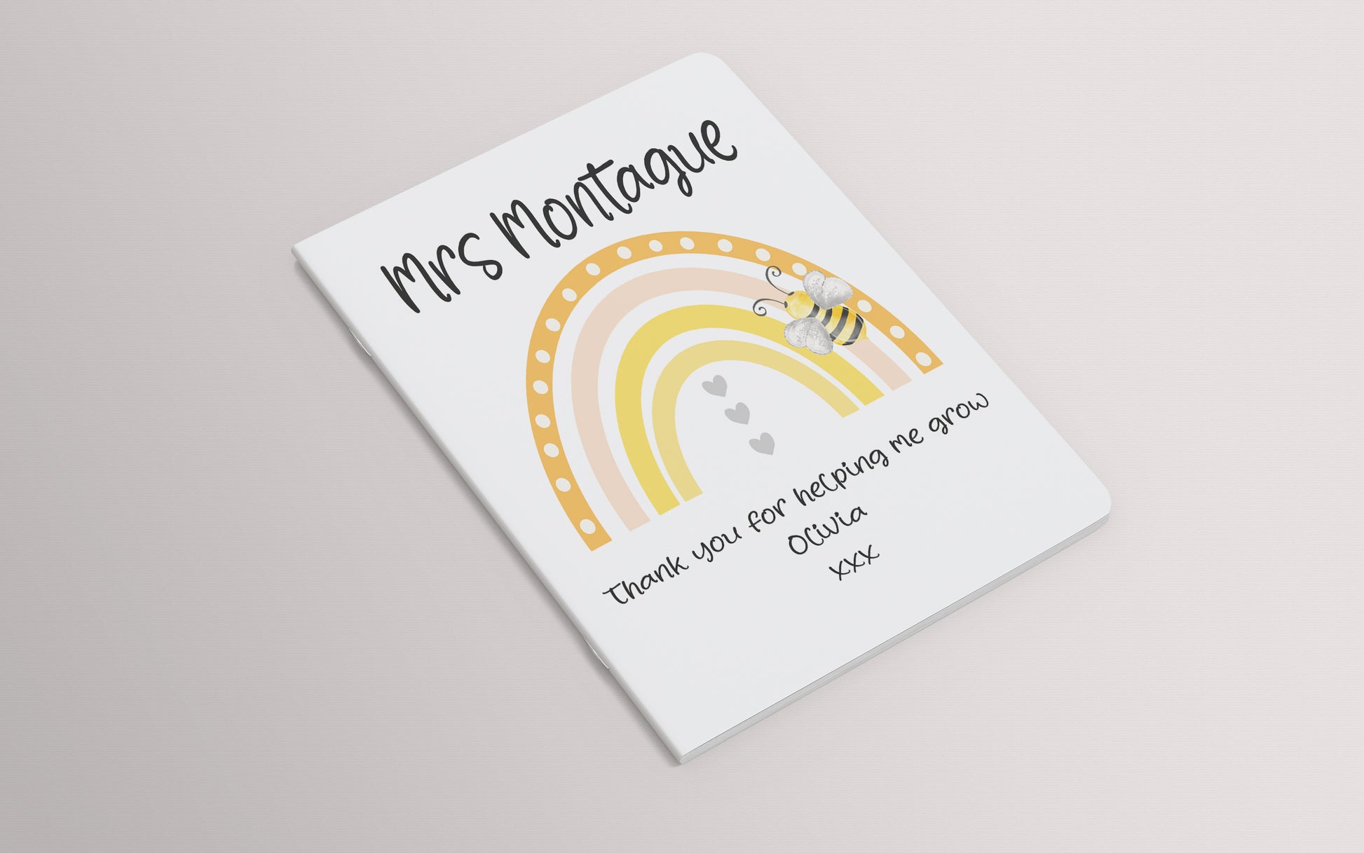 Interior blank pages of personalised rainbow and bee A5 notepad