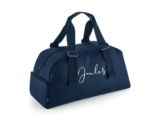 Personalised dance bags in multiple colours showing name personalisation