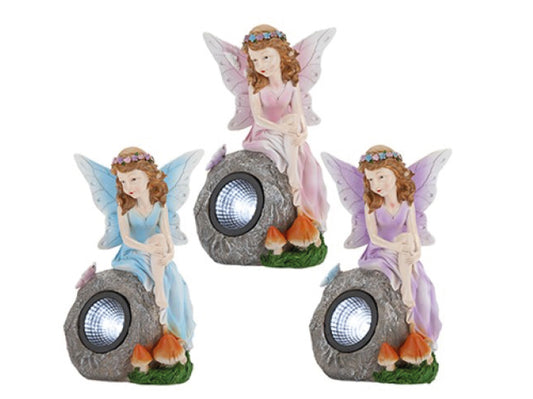 Fairy on rock solar light garden ornament in blue pink and purple options