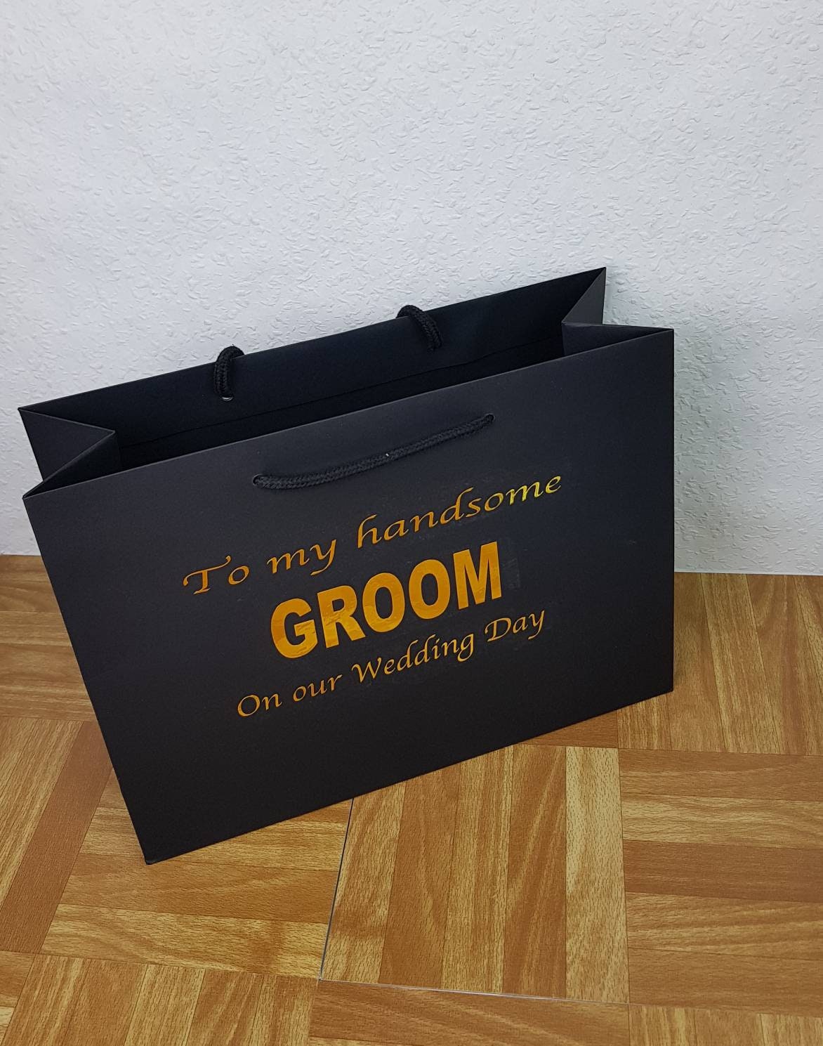 Groom gift bag showing personalised name and vinyl colour detail