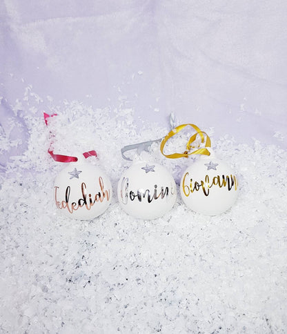 Personalised gold ceramic Christmas bauble ornament with vinyl name and ribbon