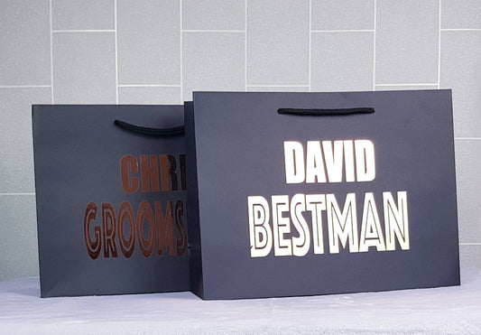 Personalised large black groomsmen gift bag with custom name and role in vinyl
