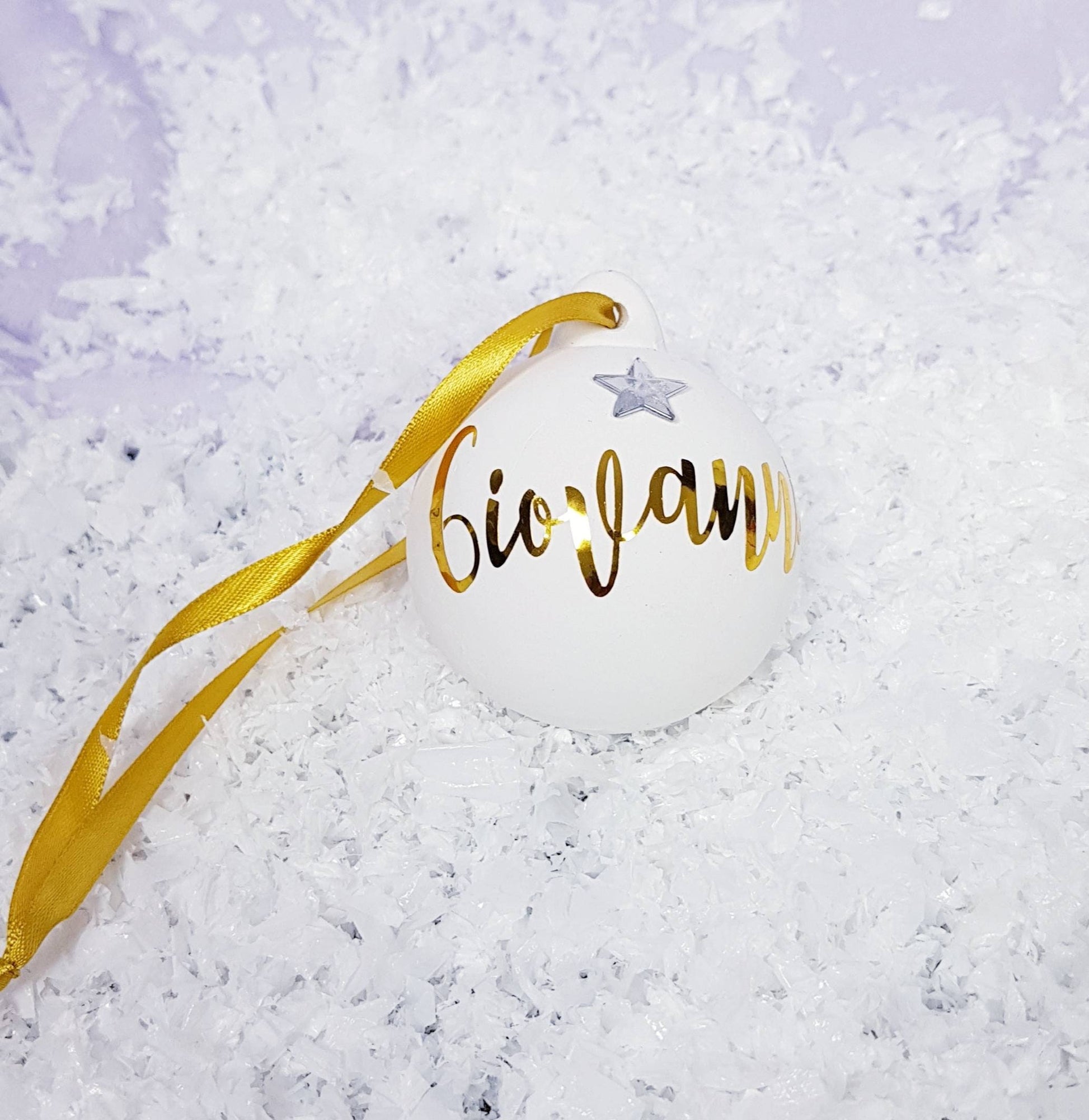 Range of personalised ceramic Christmas baubles in rose gold, gold and silver colours