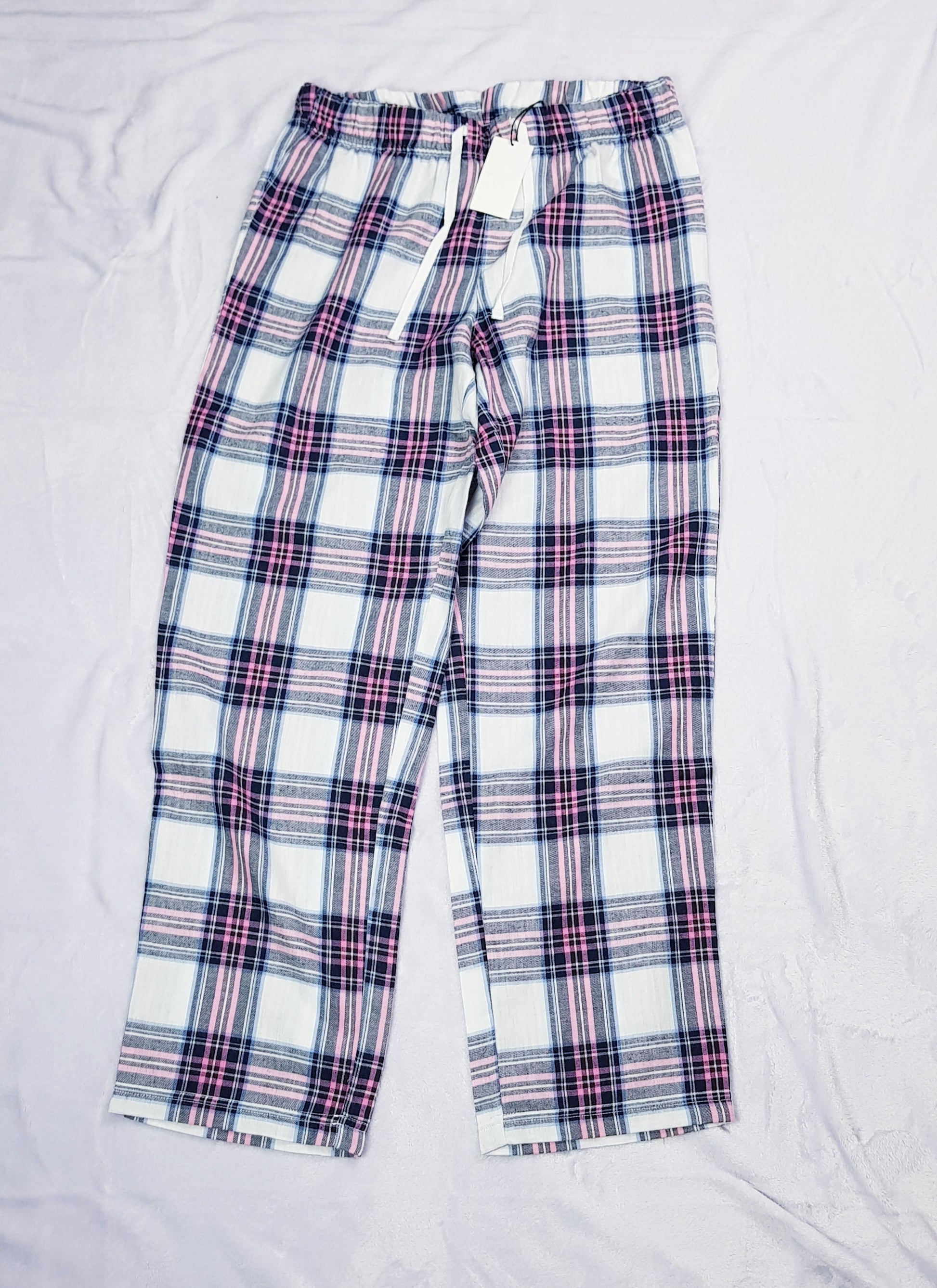 Personalised gift pouch included with Last Christmas as a Miss pyjama set for brides-to-be