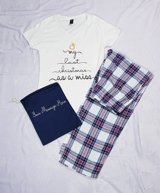 Last Christmas as a Miss pyjama set with V-neck top, tartan trousers and personalised gift pouch