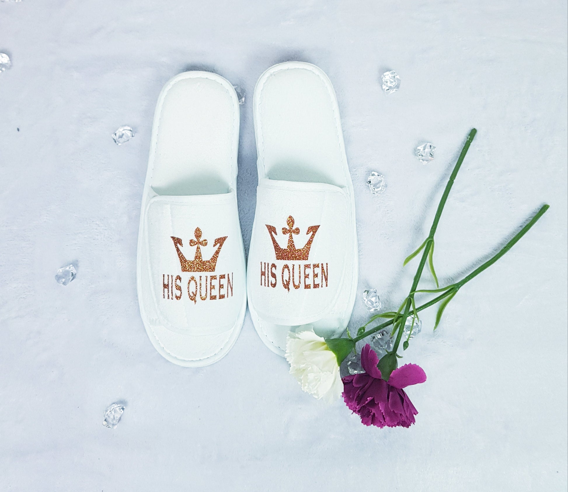 Close-up of Her King navy blue spa slipper with gold crown design and text