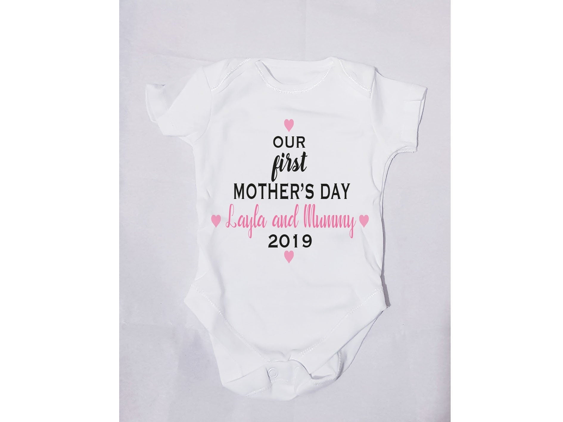 Our First Mothers Day baby bodysuit with personalised mum and baby names in pink
