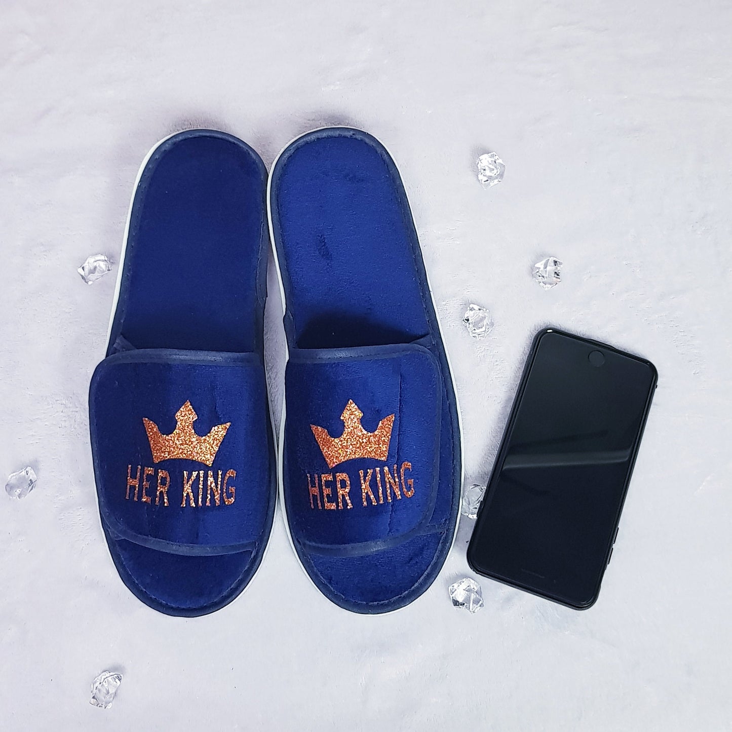 His Queen Her King couple's spa slippers shown side by side as a matching romantic gift set