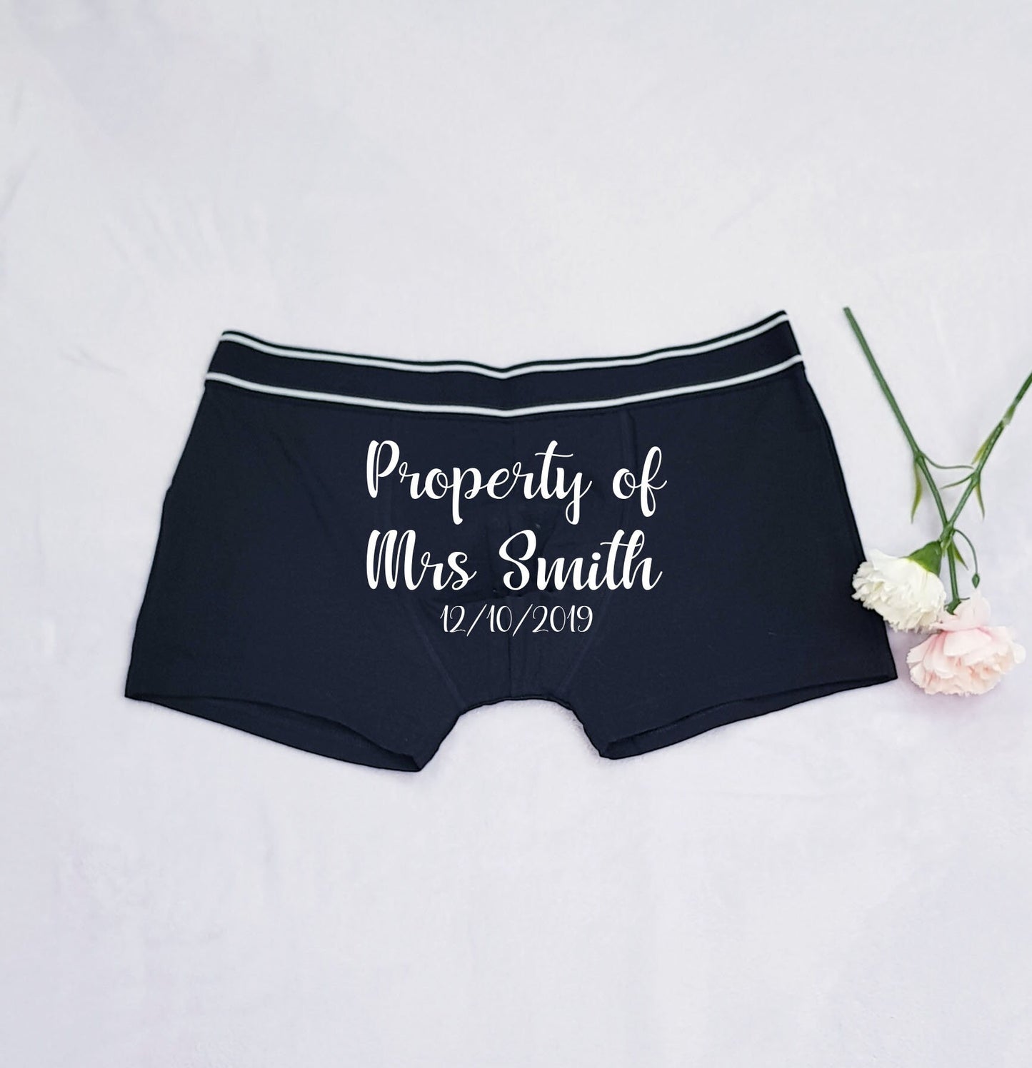 Personalised Property Of boxer shorts with wedding date, available in multiple text colours including white, gold, silver and red