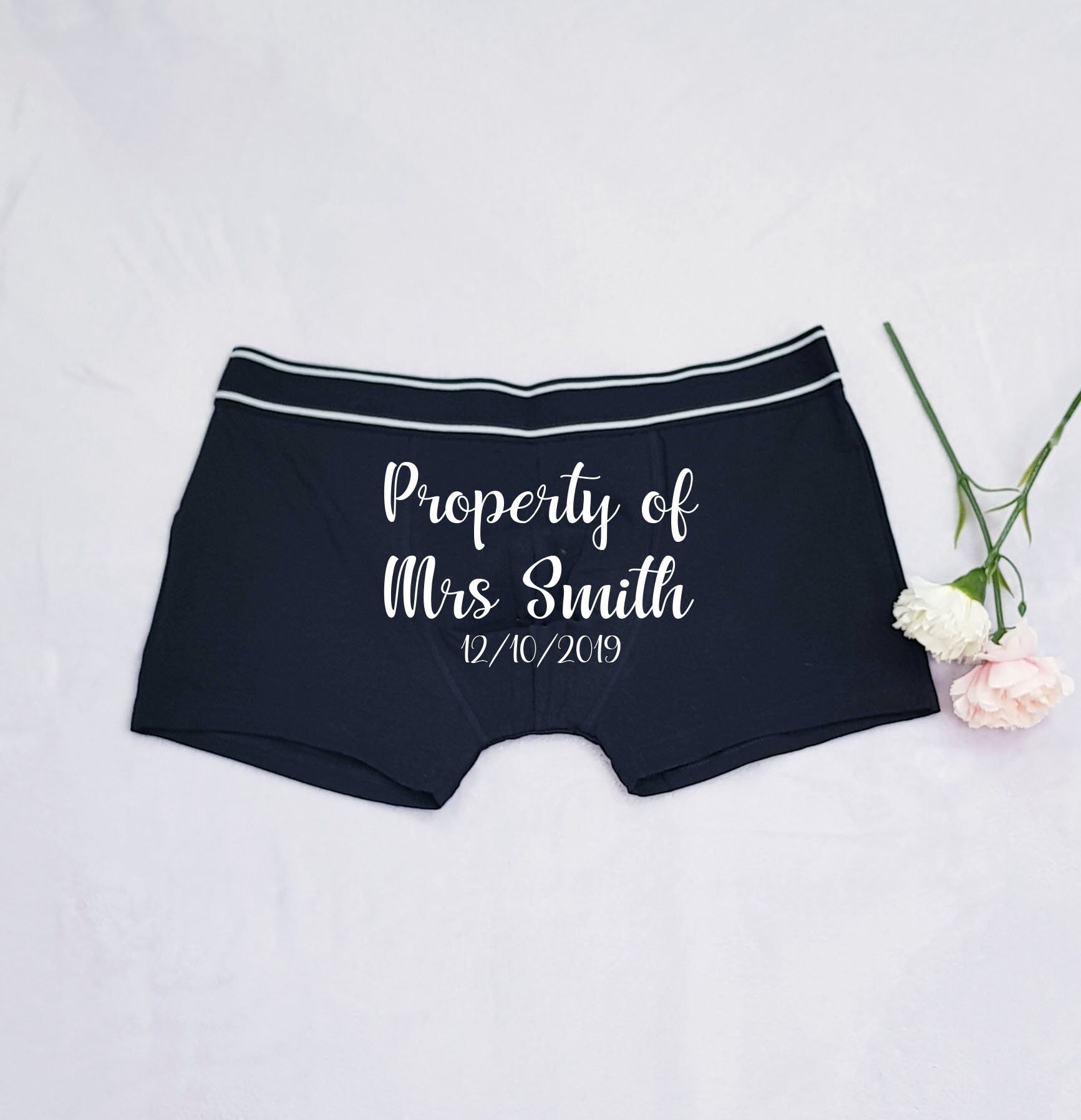 Personalised Property Of boxer shorts with wedding date, available in multiple text colours including white, gold, silver and red
