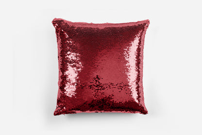 Personalised sequin reversible cushion showing sequin swiping to reveal custom text