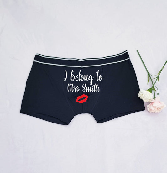 Personalised groom wedding boxers with bride's name and kiss design on black cotton