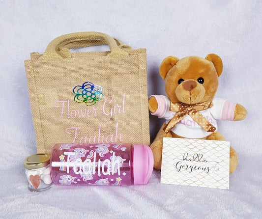 Personalised flower girl gift set in jute bag containing teddy bear, water bottle, sweetie jar and card