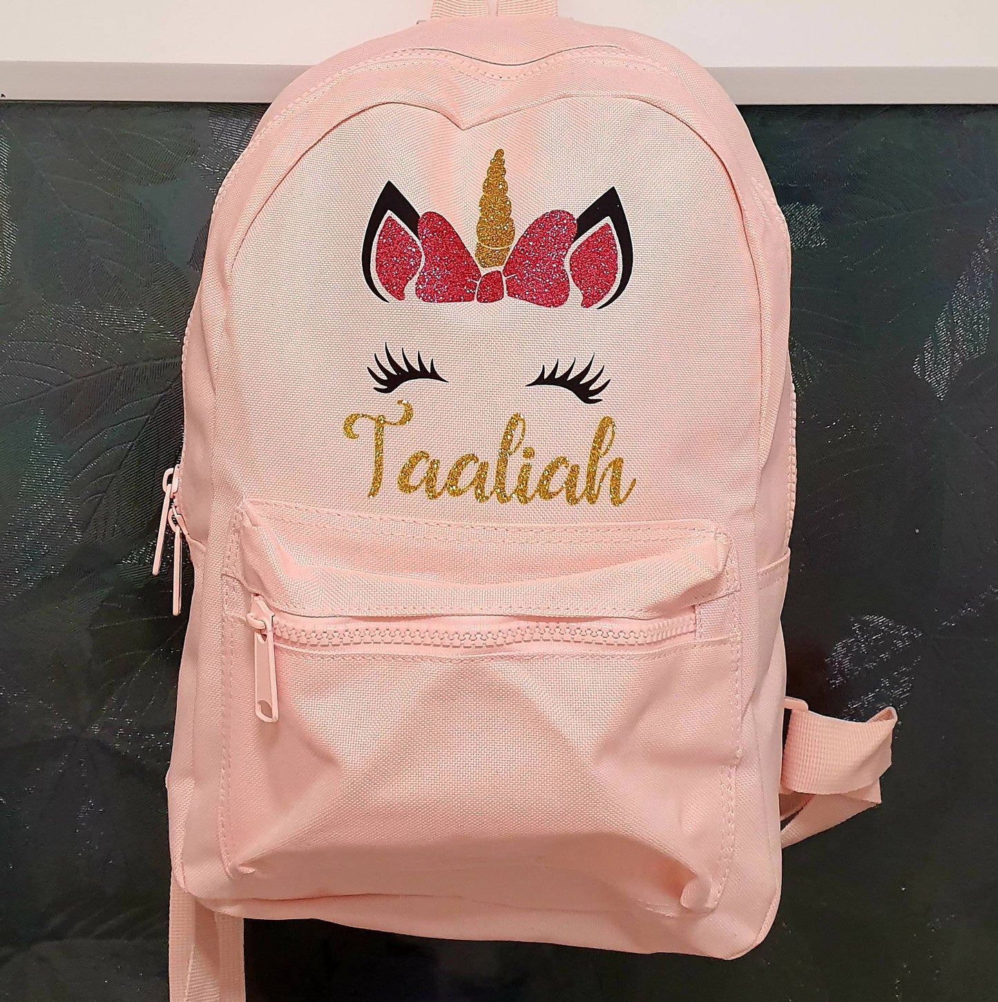 Personalised unicorn backpack with glitter unicorn face design and custom name for kids