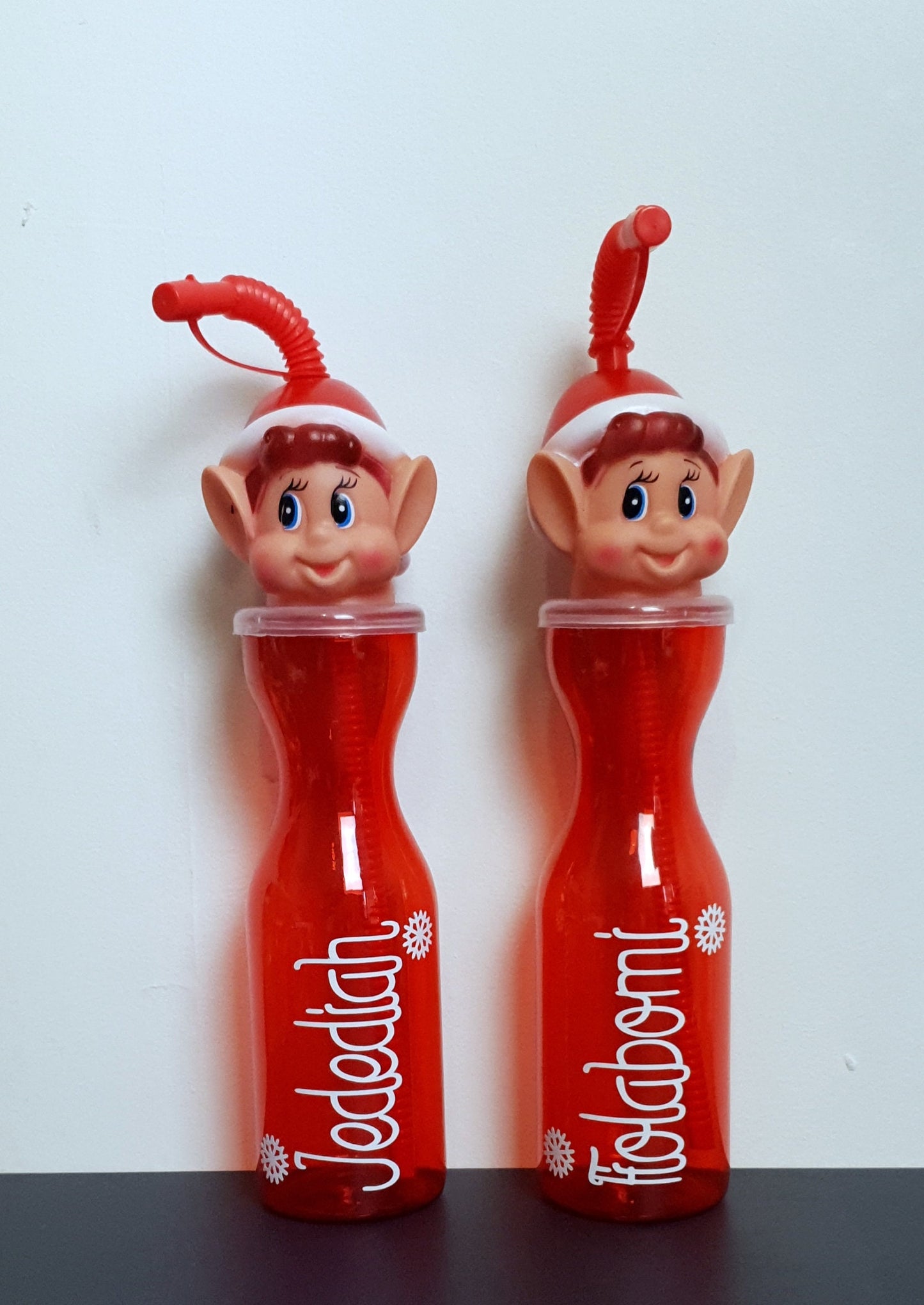 Personalised elf water bottle showing flexible straw and spill-proof lid detail