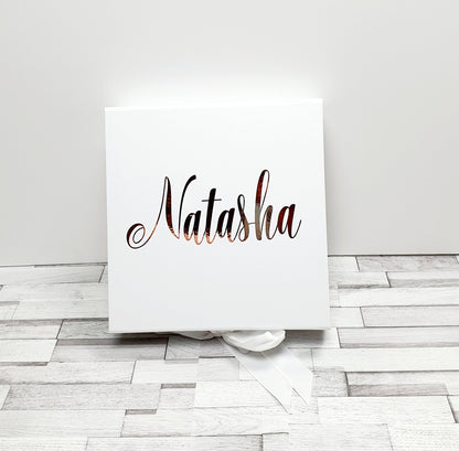 Contents of personalised gift box showing Himalayan bath salts and scented candle