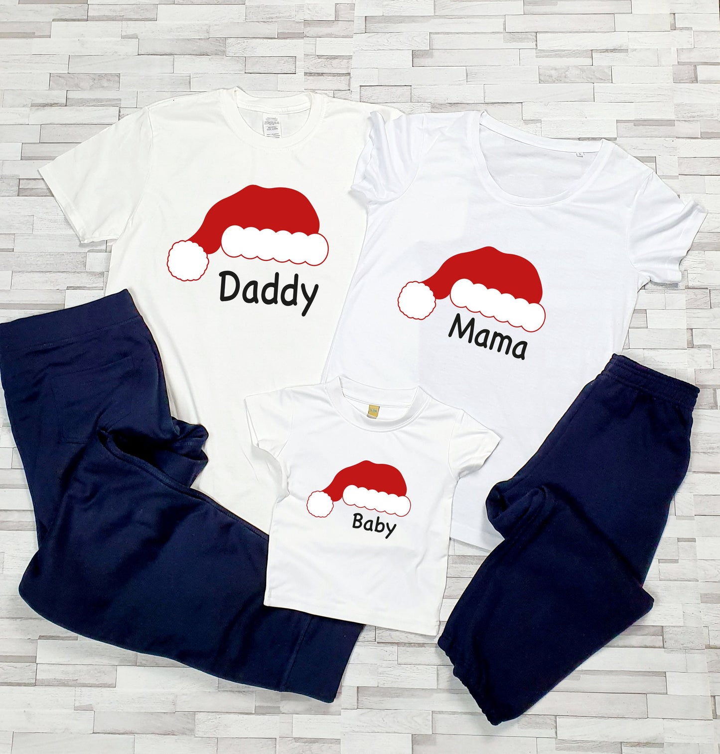 Personalised Santa family Christmas pyjamas with Santa head design and custom name on navy pants set