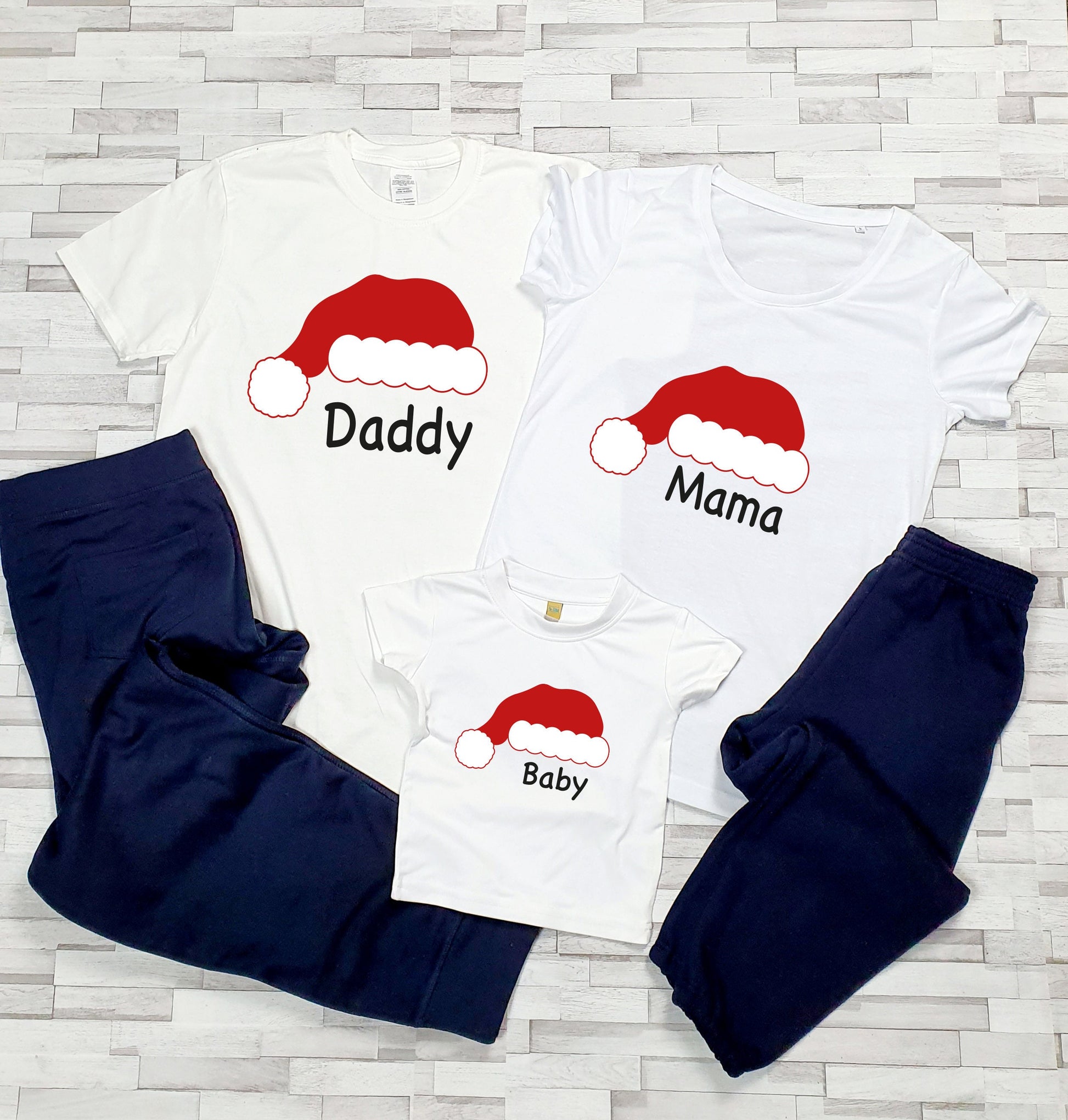 Personalised Santa family Christmas pyjamas with Santa head design and custom name on navy pants set