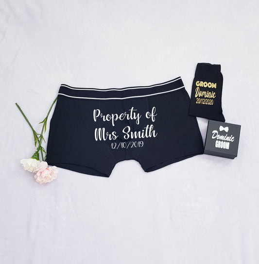 Personalised Property Of boxer shorts with bride's name in white text on black cotton boxers, a fun wedding gift for the groom