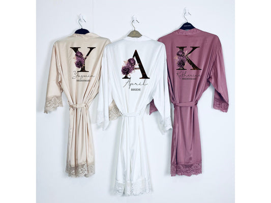 Personalised floral bridal robe in white satin with lace trim and floral monogram personalisation