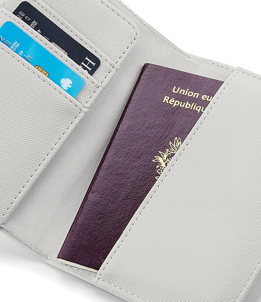 Dinosaur passport holder interior showing card slots and personalised name