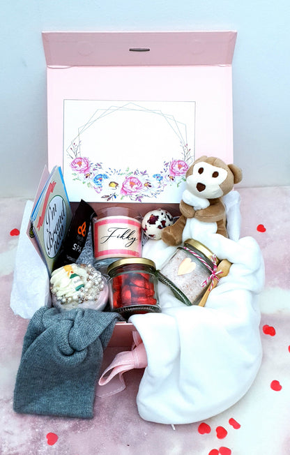 New mom spa gift box set with candle, bath bomb, bath salts, baby comforter and treats in magnetic box