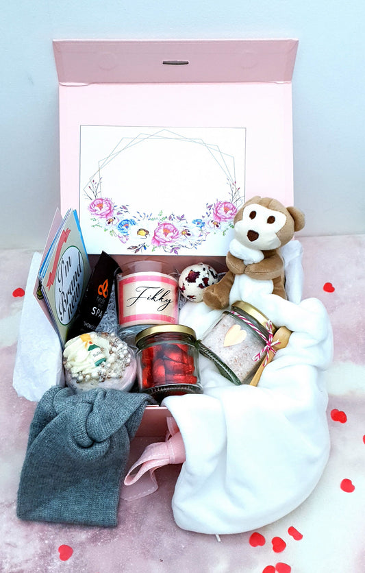 New mom spa gift box set with candle, bath bomb, bath salts, baby comforter and treats in magnetic box