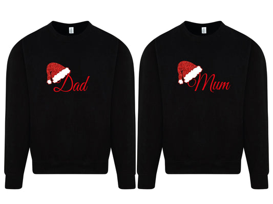 Personalised matching family Christmas jumper in black with glitter Santa hat and name design