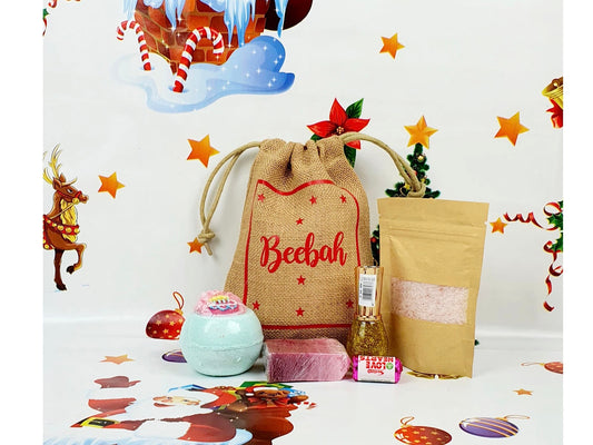 Personalised happy birthday jute gift bag filled with bath bomb, nail polish and treats