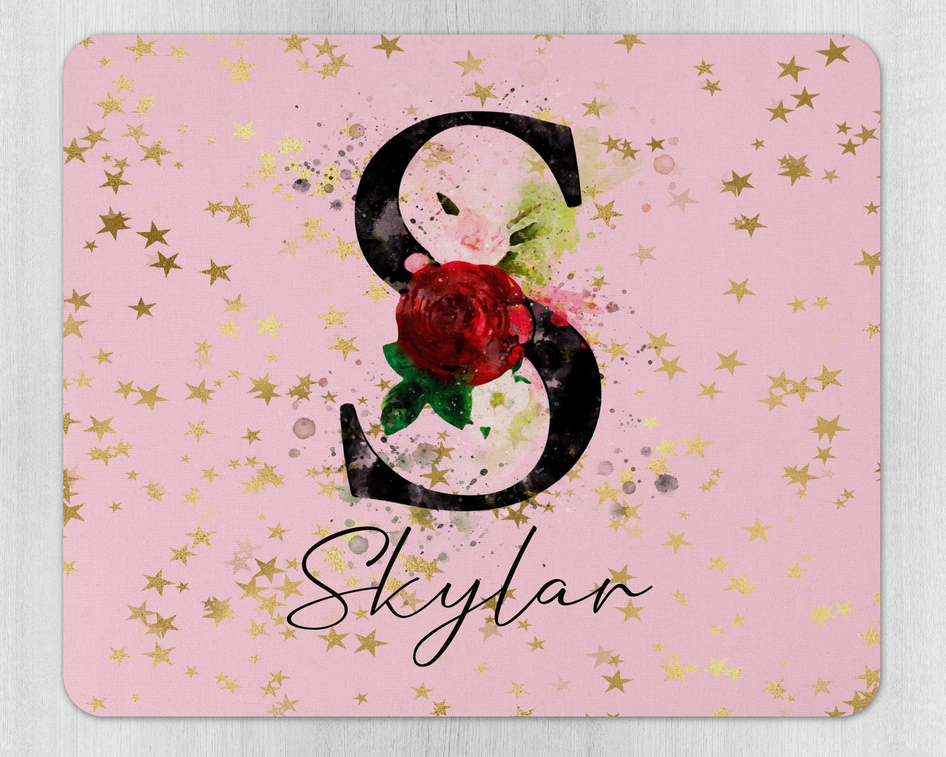 Close-up of personalised name detail on custom designed mouse pad with rubber base