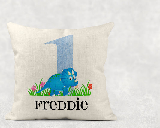 Personalised dinosaur cushion pillow for boys with colourful dinosaur design, child's name and age on canvas fabric