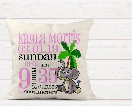 Personalised baby birth announcement cushion with name, date, weight and time next to cute animal design