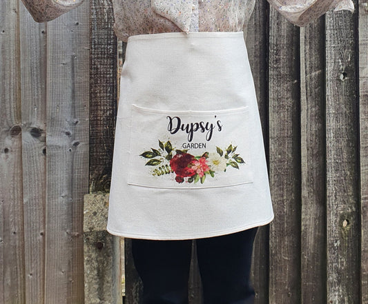 Personalised gardening apron showing waist ties and pocket detail