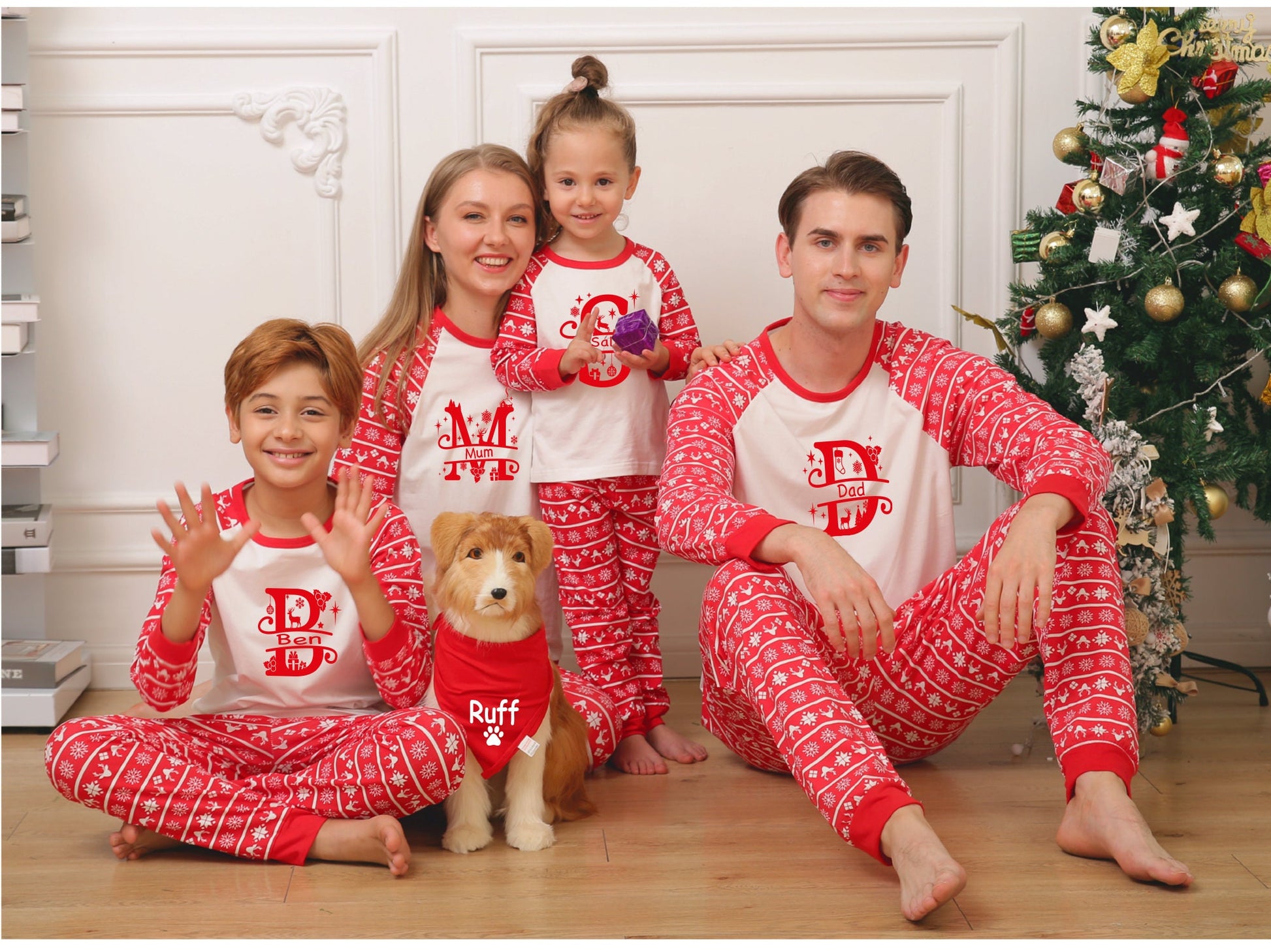 Baby grow from personalised matching family Christmas pyjamas range with festive name design